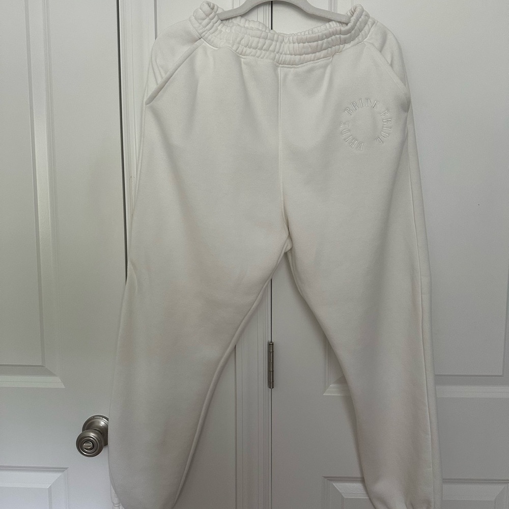 White “BRIDE” Sweatpants by Six Stories